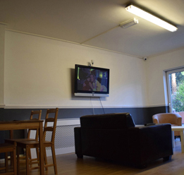 Room With Couch TV Chairs