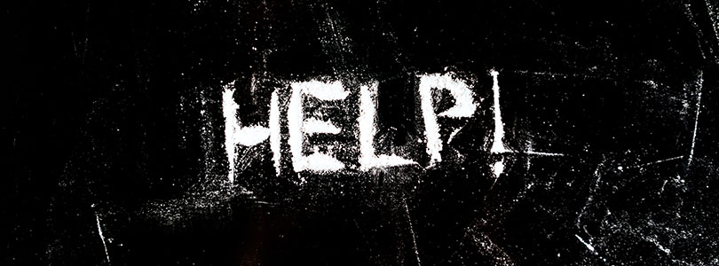 Photo of the word help written in cocaine