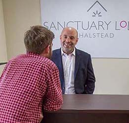 Men Talking In Sanctuary Lodge Reception